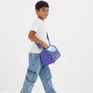 Boy carrying Harry Potter insulated lunch bag with shoulder strap